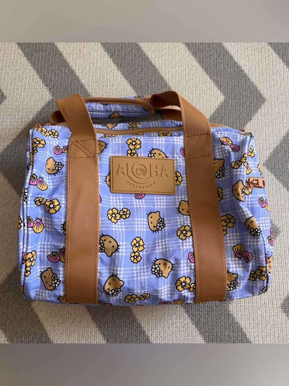Aloha Collection X Hello Kitty stubby duffle bag in periwinkle palaka